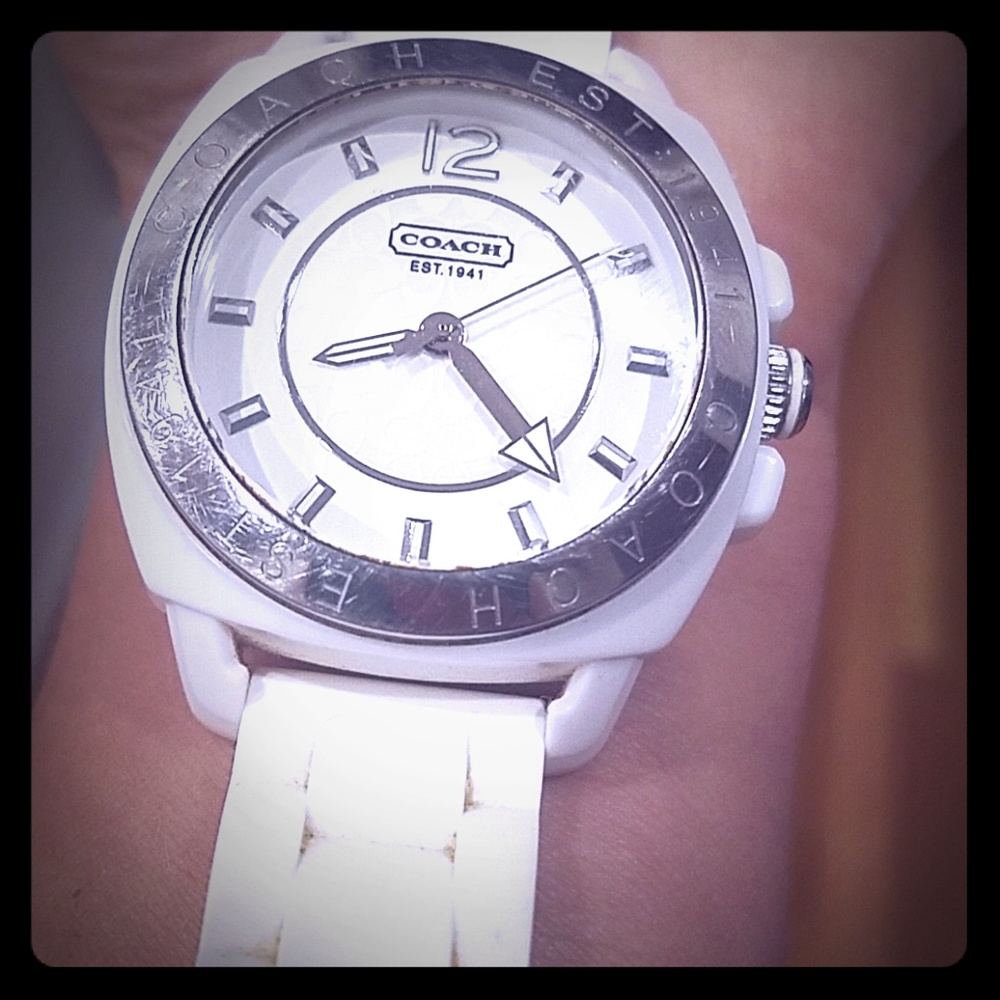 White round face rubber band Coach watch